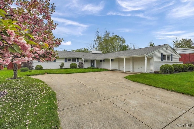 149 Fleetwood Ter, Amherst, NY 14221 - ranch-style home featuring a garage, driveway, and a front yard