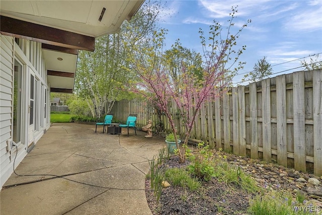 149 Fleetwood Ter, Amherst, NY 14221 - fenced backyard featuring a patio area