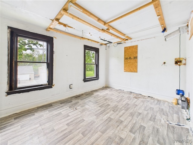 1307 Michigan Ave, Niagara Falls, NY 14305 - empty room with wood finished floors and baseboards