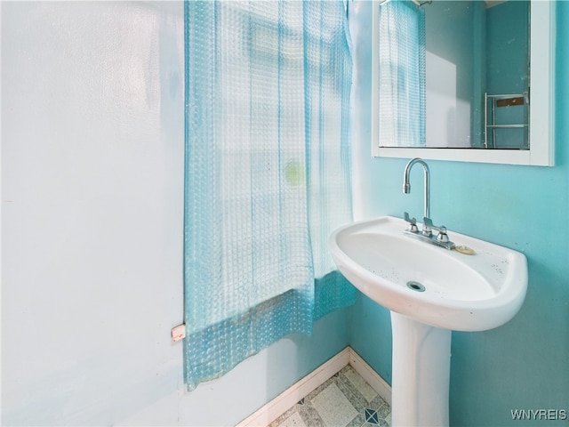 1307 Michigan Ave, Niagara Falls, NY 14305 - bathroom with baseboards