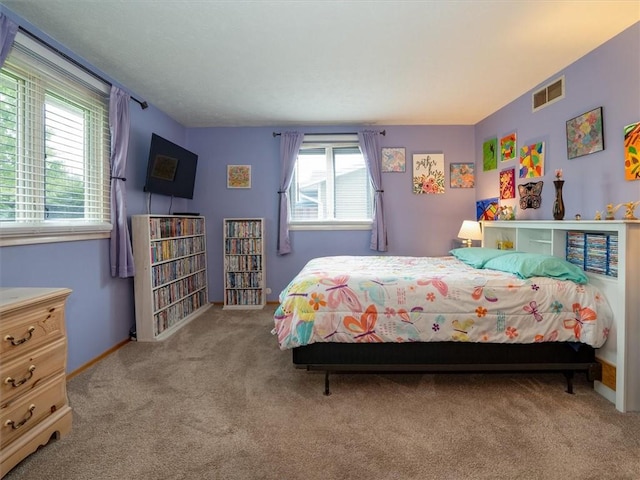 39 Sahara Dr, Gates, NY 14624 - carpeted bedroom featuring baseboards