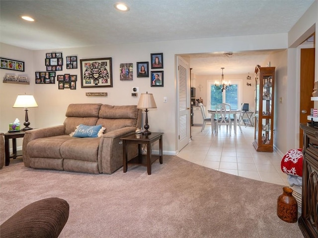 39 Sahara Dr, Gates, NY 14624 - living area with light carpet, a chandelier, baseboards, light tile patterned floors, and recessed lighting