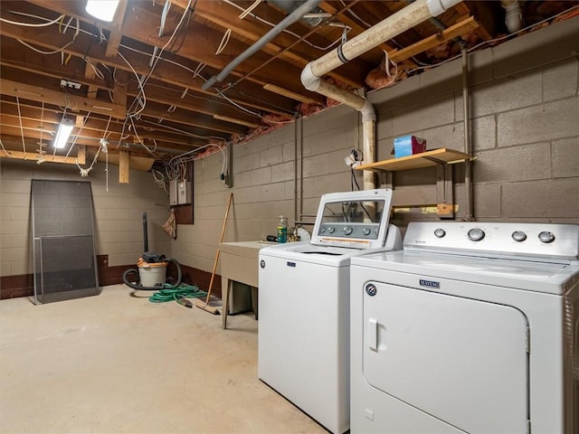 39 Sahara Dr, Gates, NY 14624 - laundry room featuring independent washer and dryer, concrete block wall, and electric panel