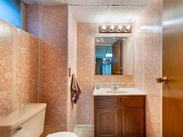 39 Sahara Dr, Gates, NY 14624 - half bath featuring toilet, vanity, and wallpapered walls