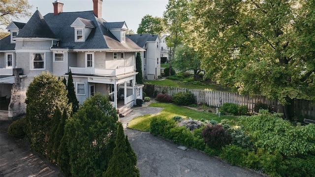 44 Riverside Dr, Binghamton-City, NY 13905 - rear view of property featuring a balcony and a chimney