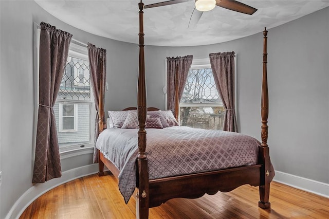 44 Riverside Dr, Binghamton-City, NY 13905 - bedroom with baseboards, wood finished floors, and ceiling fan