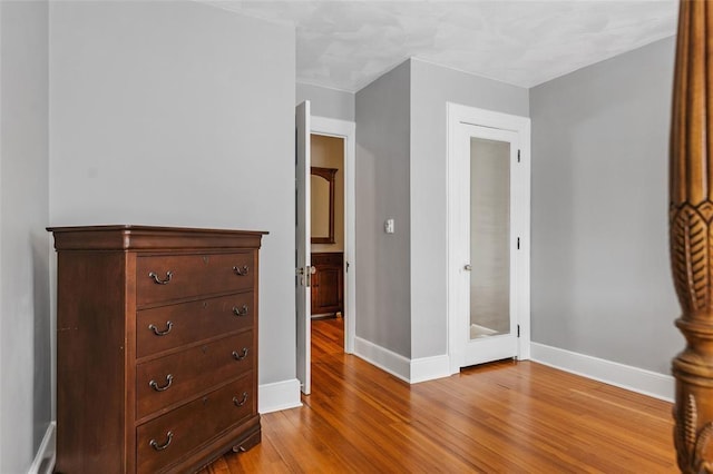 44 Riverside Dr, Binghamton-City, NY 13905 - bedroom with wood finished floors and baseboards