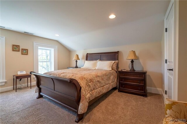 8785 Main St, Clarence, NY 14221 - bedroom with carpet floors, lofted ceiling, baseboards, and recessed lighting