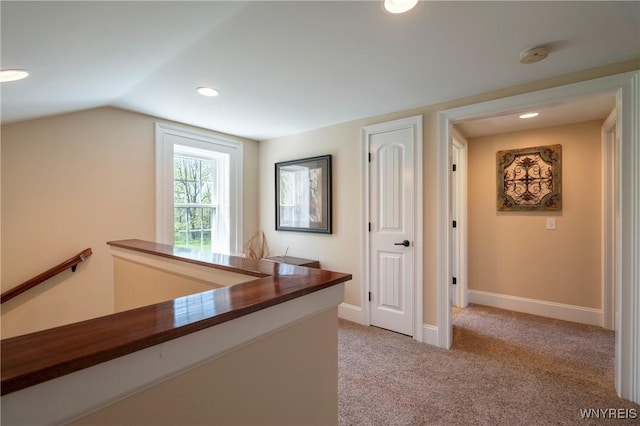 8785 Main St, Clarence, NY 14221 - corridor with baseboards, light carpet, recessed lighting, and lofted ceiling