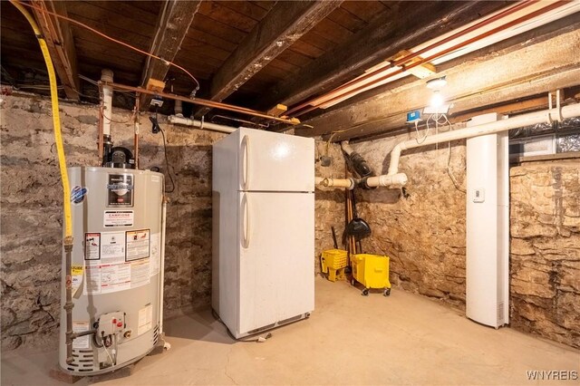8785 Main St, Clarence, NY 14221 - unfinished below grade area featuring freestanding refrigerator and water heater