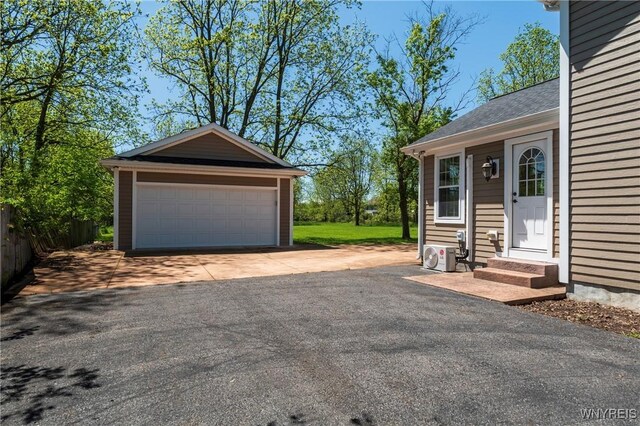 8785 Main St, Clarence, NY 14221 - detached garage with ac unit