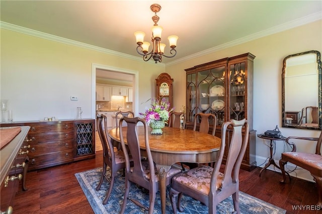 8785 Main St, Clarence, NY 14221 - dining room with ornamental molding, dark wood-style flooring, a chandelier, and baseboards