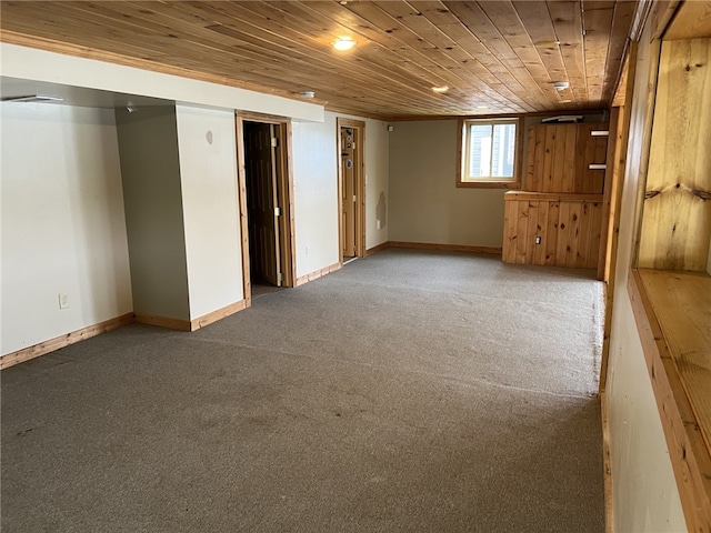 8976 Trio Dr, Urbana, NY 14840 - below grade area with carpet, wood ceiling, and baseboards