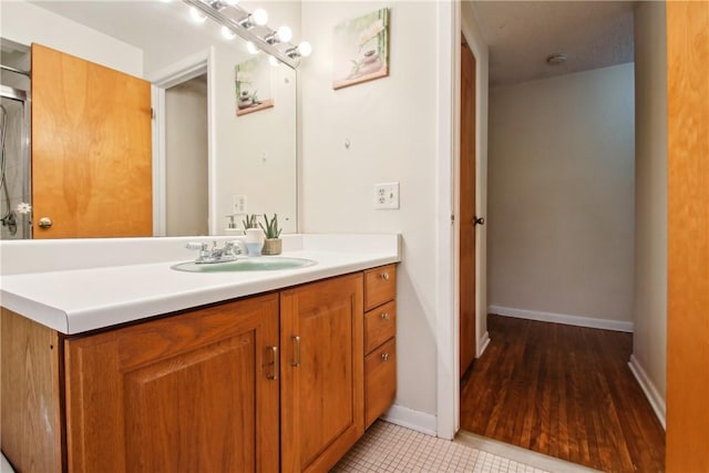 489 Bridgewood Dr, Greece, NY 14612 - bathroom featuring vanity, baseboards, and tile patterned flooring