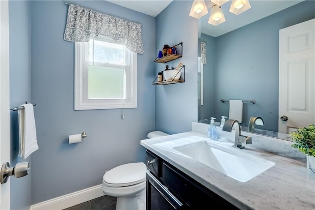 272 Shaftsbury Rd, Brighton, NY 14610 - half bathroom with toilet, vanity, baseboards, and tile patterned floors