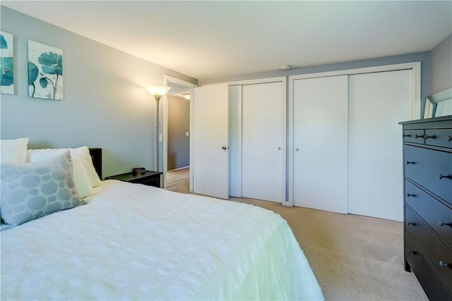 272 Shaftsbury Rd, Brighton, NY 14610 - bedroom featuring multiple closets and light carpet