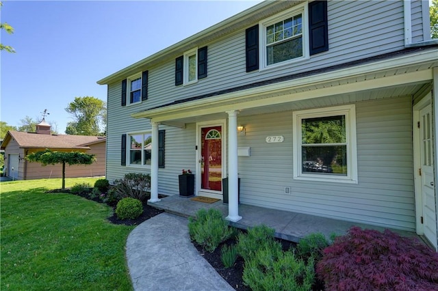 272 Shaftsbury Rd, Brighton, NY 14610 - view of front of property with a porch and a front yard