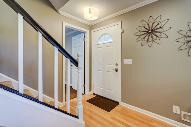 272 Shaftsbury Rd, Brighton, NY 14610 - entrance foyer featuring light wood finished floors, stairway, ornamental molding, and baseboards