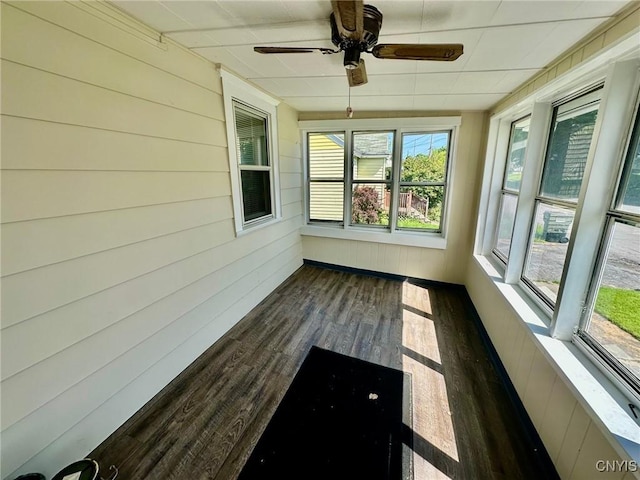 131 Hazelhurst Ave, Syracuse, NY 13206 - unfurnished sunroom with wood finished floors, ceiling fan, and wood walls