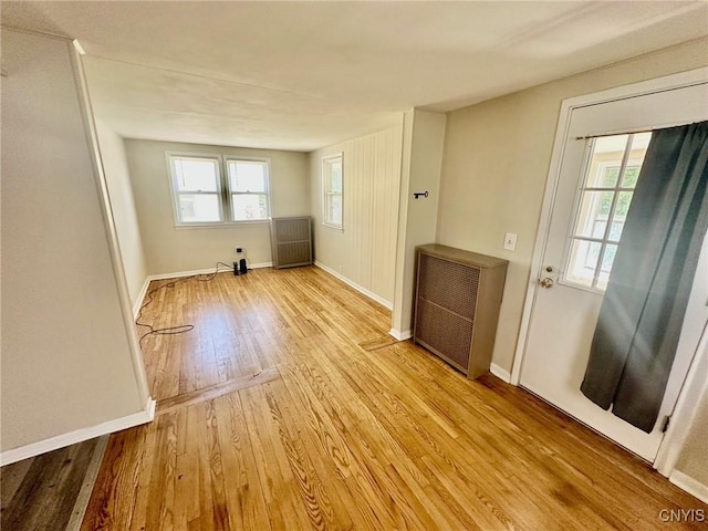 131 Hazelhurst Ave, Syracuse, NY 13206 - entrance foyer with wood finished floors, radiator heating unit, and baseboards