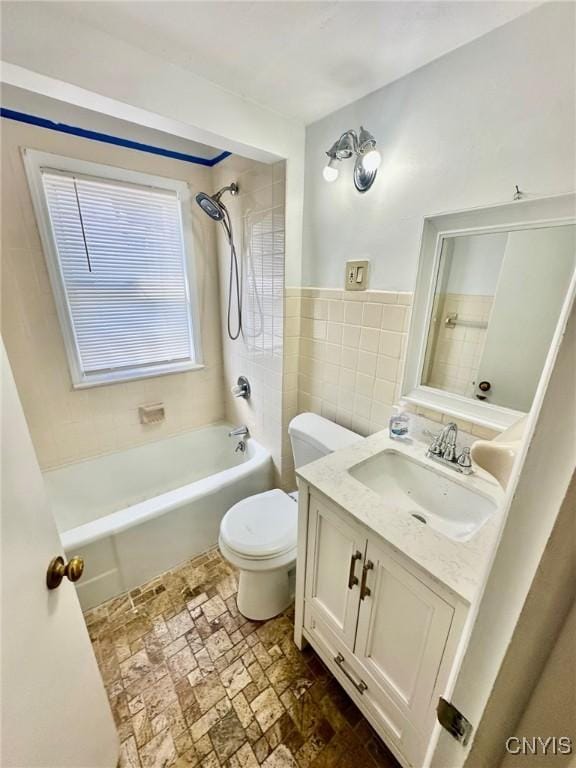 131 Hazelhurst Ave, Syracuse, NY 13206 - full bathroom with toilet, bathing tub / shower combination, vanity, and tile walls