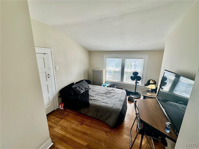 131 Hazelhurst Ave, Syracuse, NY 13206 - bedroom featuring wood finished floors, lofted ceiling, and baseboards