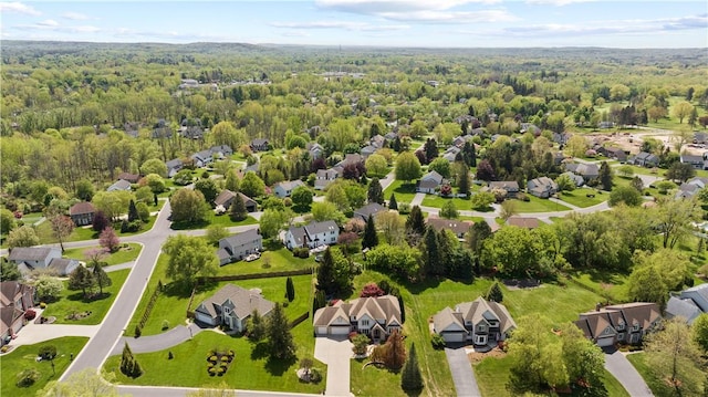 23 Sunberry Dr, Perinton, NY 14526 - aerial view of residential area with a heavily wooded area