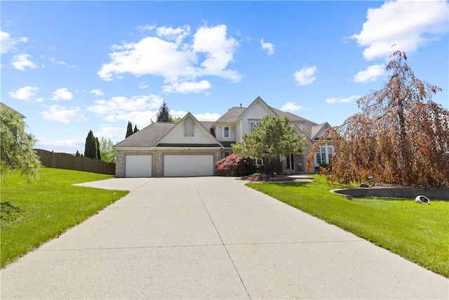 23 Sunberry Dr, Perinton, NY 14526 - traditional home featuring concrete driveway and an attached garage