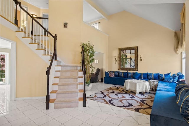 23 Sunberry Dr, Perinton, NY 14526 - tiled living area featuring stairs and high vaulted ceiling