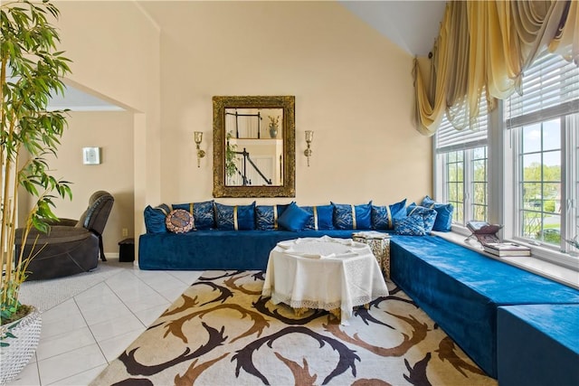 23 Sunberry Dr, Perinton, NY 14526 - living area featuring high vaulted ceiling and tile patterned flooring