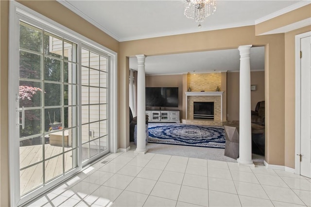 23 Sunberry Dr, Perinton, NY 14526 - unfurnished living room with ornate columns, crown molding, a fireplace, baseboards, and carpet