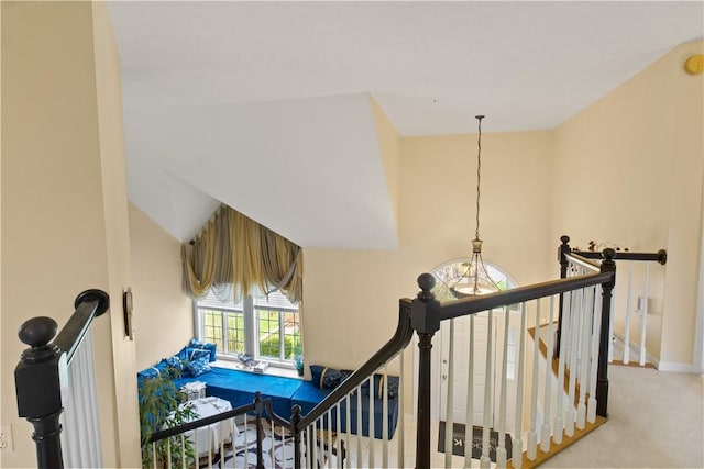 23 Sunberry Dr, Perinton, NY 14526 - stairway featuring baseboards, carpet floors, and a chandelier