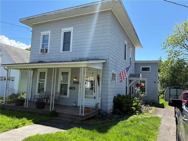 115 12th St, Dix, NY 14891 - view of front facade with a porch and cooling unit