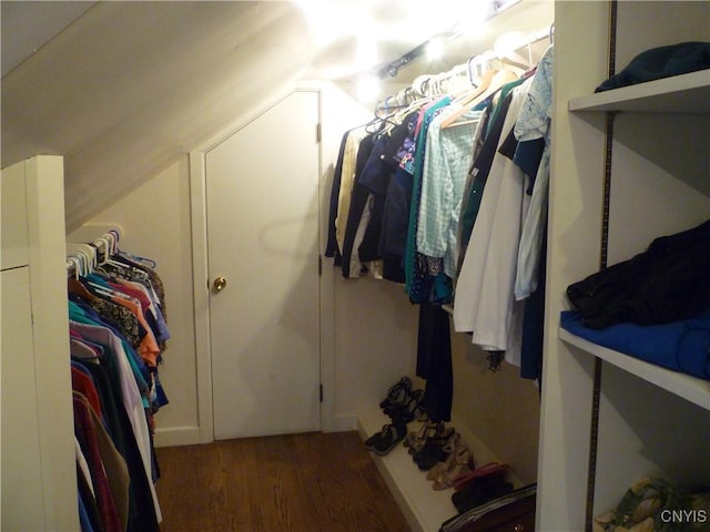 3899 Sweet Rd, Pompey, NY 13078 - walk in closet featuring wood finished floors and vaulted ceiling
