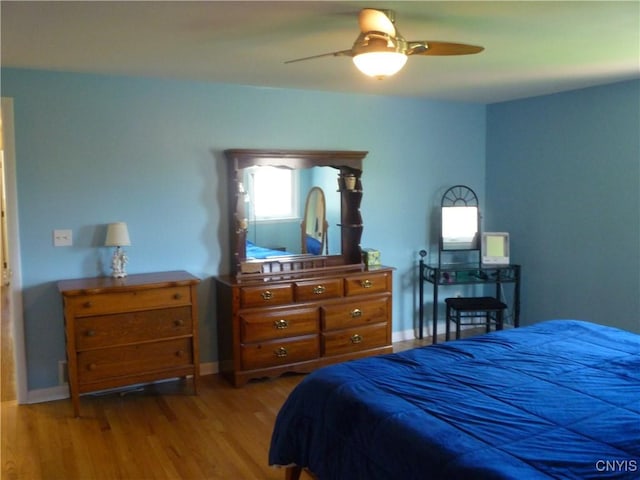 3899 Sweet Rd, Pompey, NY 13078 - bedroom featuring wood finished floors, baseboards, and ceiling fan