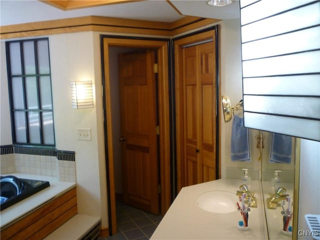 3899 Sweet Rd, Pompey, NY 13078 - bathroom with decorative backsplash, tile patterned floors, and a sink