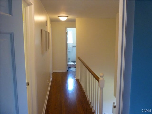 3899 Sweet Rd, Pompey, NY 13078 - hallway featuring an upstairs landing, wood finished floors, and baseboards