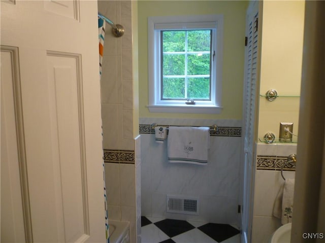 3899 Sweet Rd, Pompey, NY 13078 - full bathroom featuring tile walls, a shower, a bath, and a wainscoted wall