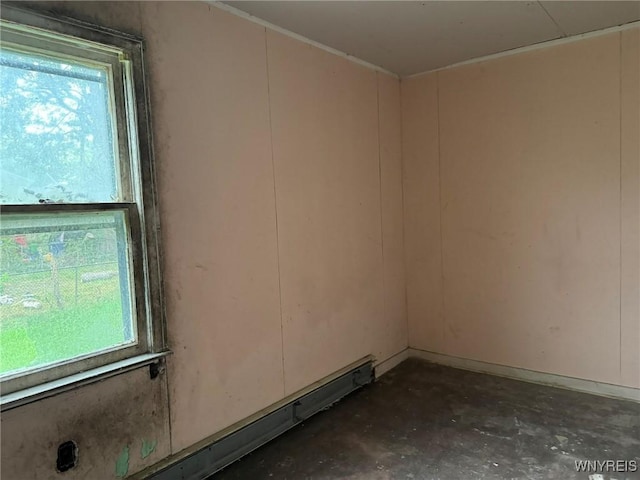 1867 Pierce Ave, Niagara Falls, NY 14301 - empty room featuring plenty of natural light and unfinished concrete floors