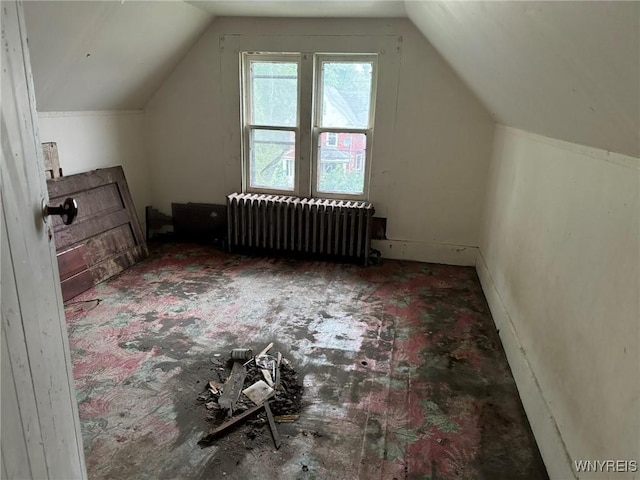 1867 Pierce Ave, Niagara Falls, NY 14301 - additional living space with radiator, vaulted ceiling, and carpet flooring