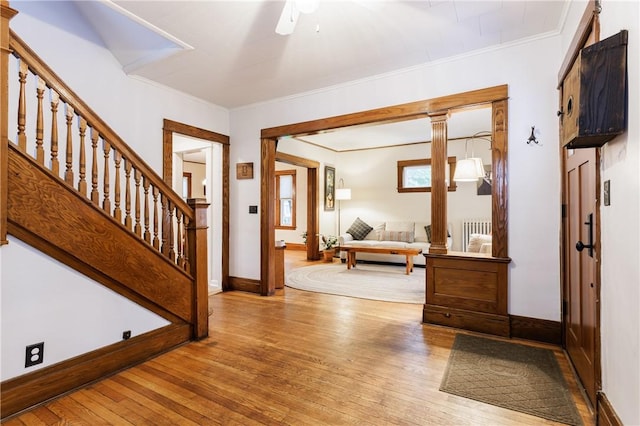 110 Lansdale St, Rochester, NY 14620 - foyer featuring hardwood / wood-style floors, ornamental molding, stairway, baseboards, and ceiling fan