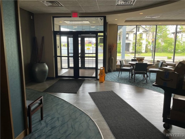 151 Buffalo Ave Unit 404, Niagara Falls, NY 14303 - community lobby featuring a paneled ceiling