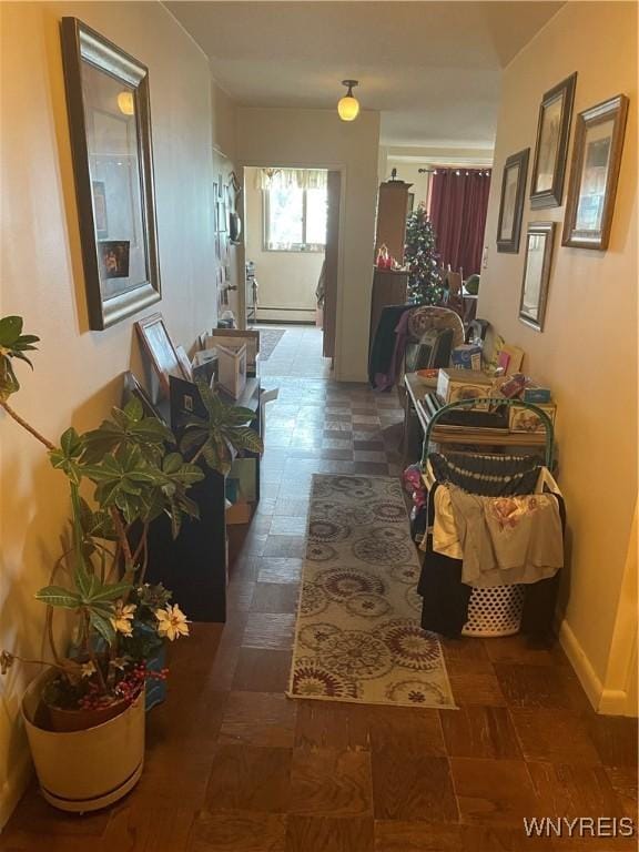 151 Buffalo Ave Unit 404, Niagara Falls, NY 14303 - hall featuring a baseboard heating unit and baseboards