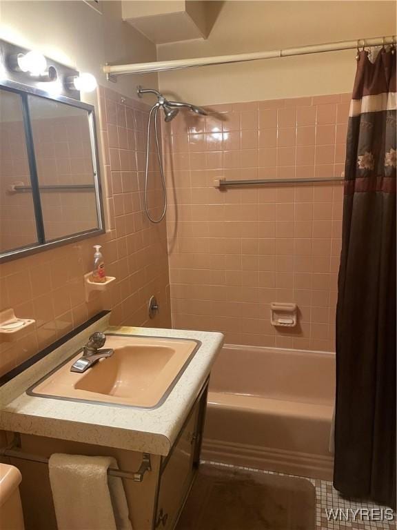 151 Buffalo Ave Unit 404, Niagara Falls, NY 14303 - bathroom with shower / bath combo and tile walls