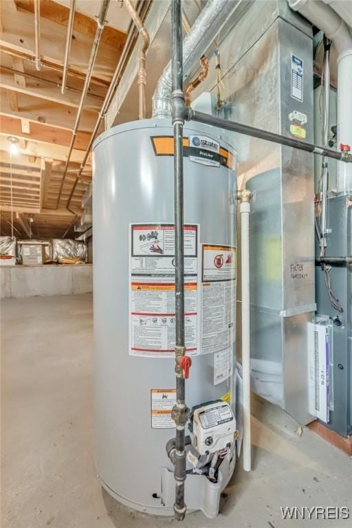 24 Bluejay Cir, Lancaster, NY 14086 - utility room with gas water heater and heating unit
