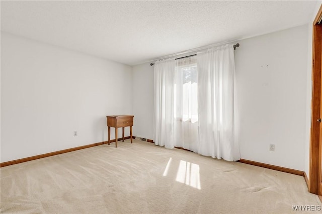 24 Bluejay Cir, Lancaster, NY 14086 - carpeted spare room featuring baseboards