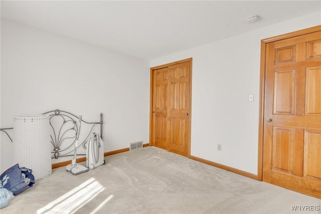 24 Bluejay Cir, Lancaster, NY 14086 - unfurnished bedroom featuring carpet and baseboards