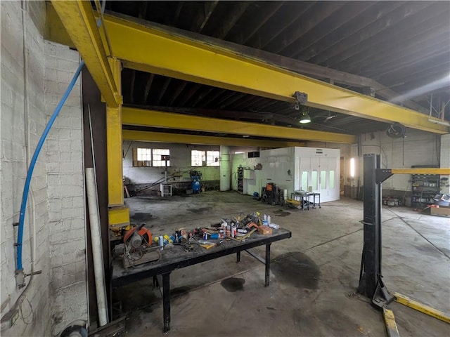 1077 Looker Mtn, Otto Twp, PA 16745 - garage featuring concrete block wall