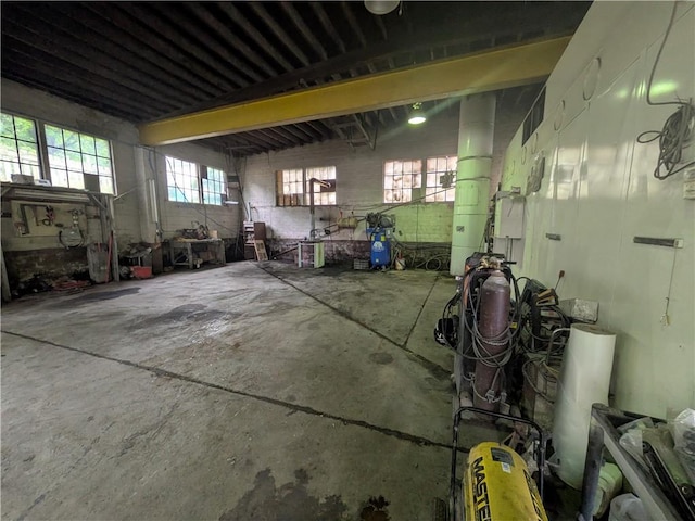 1077 Looker Mtn, Otto Twp, PA 16745 - garage featuring concrete block wall