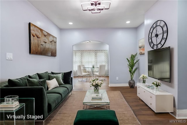 405 W Ferry St, Buffalo, NY 14213 - living room featuring arched walkways, wood finished floors, baseboards, and recessed lighting